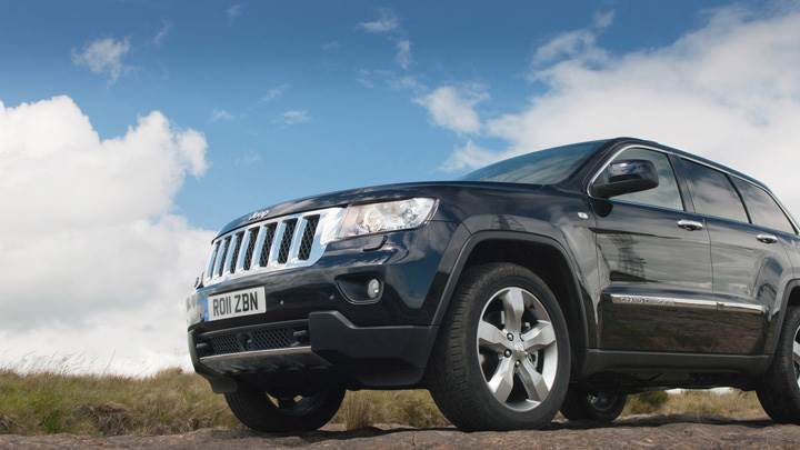 2011 Jeep Grand Cherokee Front Headlight in Black